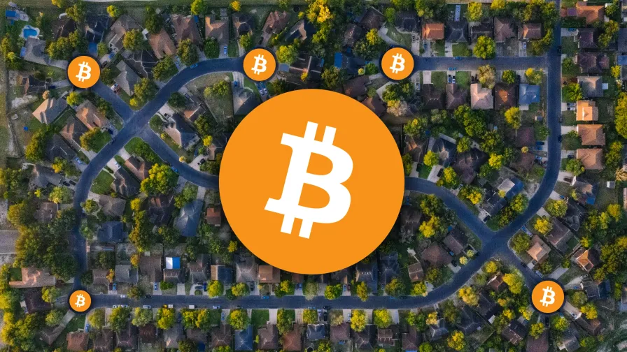 Aerial view of a neighborhood with multiple Bitcoin symbols connected, centered around a large Bitcoin logo.
