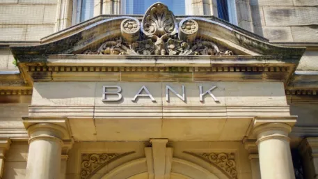 The stone entrance of a bank with columns and the word Bank above the doorway.